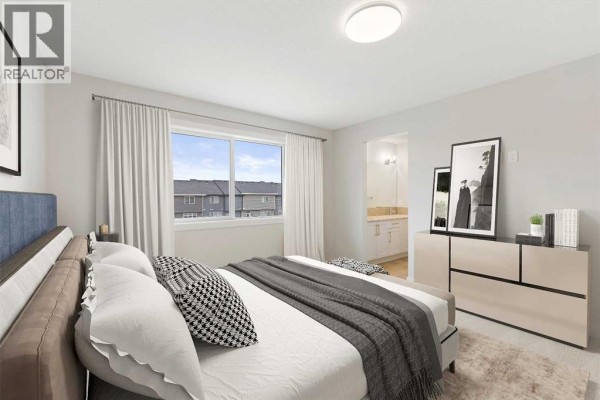 Bedroom with king-size bed, large window, dresser, and view of en-suite bathroom. - 286 Waterford Road, Chestermere