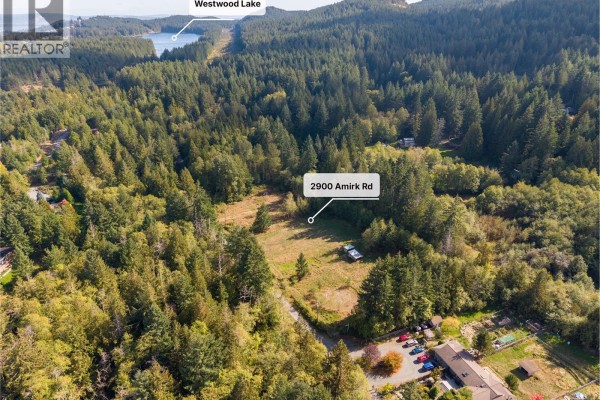 Aerial view of the property at 2900 Amrik Rd showing the cleared lot. - 2900 Amrik Rd, Nanaimo