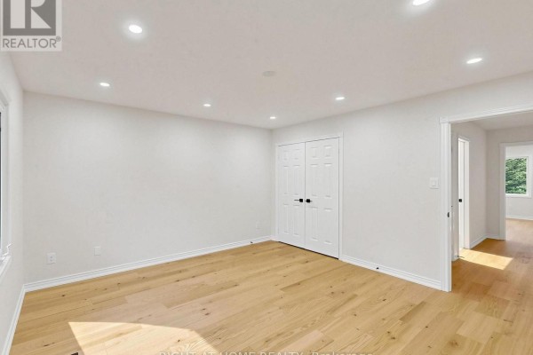Bedroom with recessed lighting, double closet, and hardwood floors - 2920 Kingsway Drive Oakville