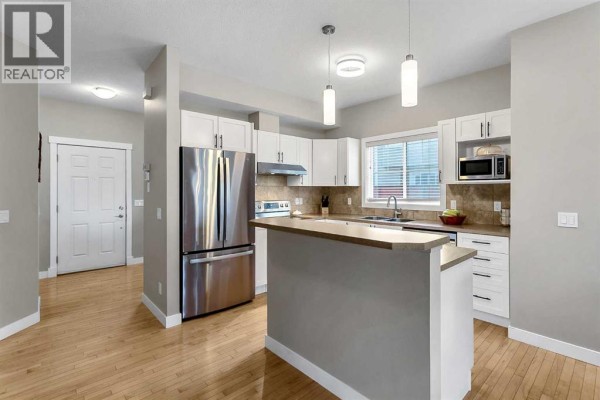 Den - 294 Cranston Drive Se, Calgary, AB T3M0G4 Photo 4