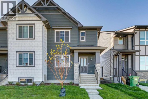Family room - 297 Creekside Drive Sw, Calgary, AB T2X4A8 Photo 3