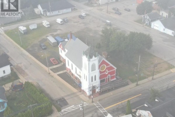 Aerial view of the former church building at 298 Granville Street, Bridgetown, with surrounding town. - 298 Granville Street, Bridgetown