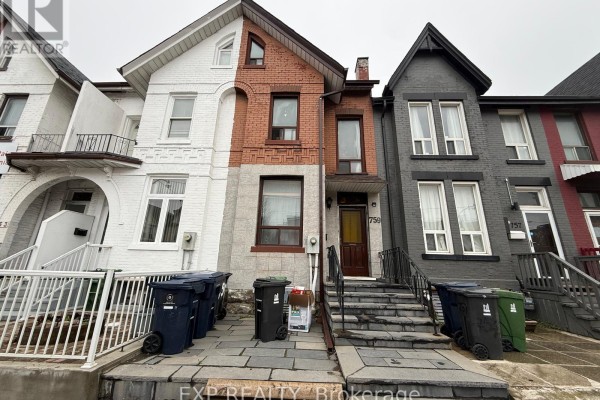 Exterior view of brick townhouses with dark gray and white facades. - 2nd Fl - 759 Gerrard Street E, Toronto