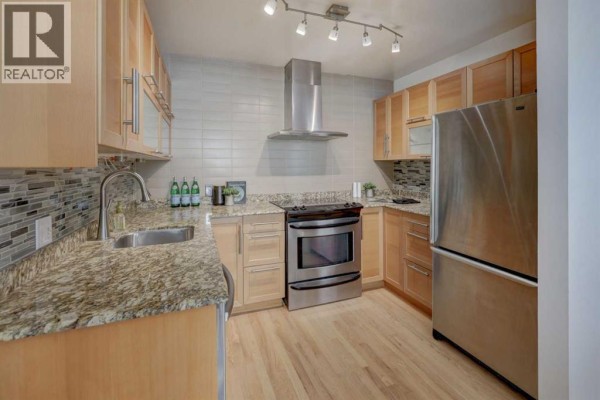 Living room - 3, 1921 5 Street Sw, Calgary, AB T2S2B2 Photo 5