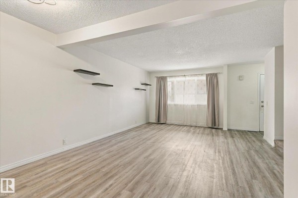 Family room - #3 18010 98 Av Nw, Edmonton, AB T5T3H6 Photo 4