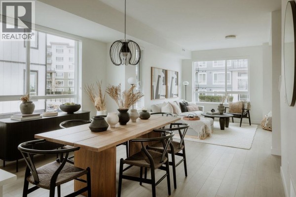 Open concept living and dining area with large windows and modern furniture. - 3 4552 Cattail Way, Tsawwassen