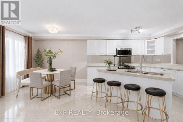 Glass-enclosed entryway to a townhouse with double doors and a shoe cabinet. - 3 Baffin Court, Richmond Hill