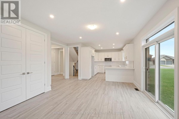 Modern kitchen with island and white cabinets - 3 Bouw Street Dutton/Dunwich