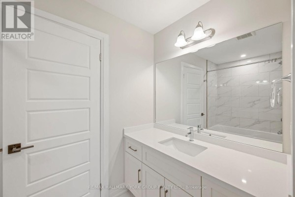 Modern bathroom with white vanity, sink, mirror, and tiled shower - 3 Bouw Street Dutton/Dunwich