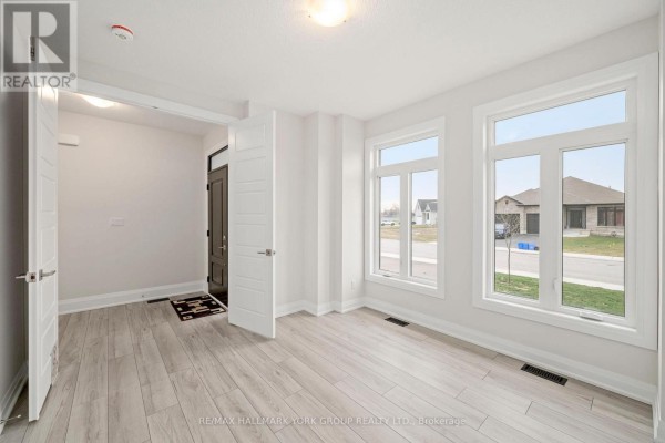 Bright hallway with light wood floors, double doors, and large windows - 3 Bouw Street Dutton/Dunwich