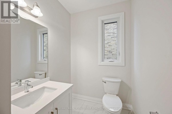 Modern bathroom with vanity, sink, mirror, and toilet - 3 Bouw Street Dutton/dunwich