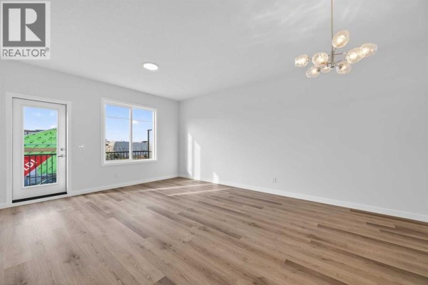 Dining room - 30 Creekside Avenue Sw, Calgary, AB T2X6E2 Photo 4