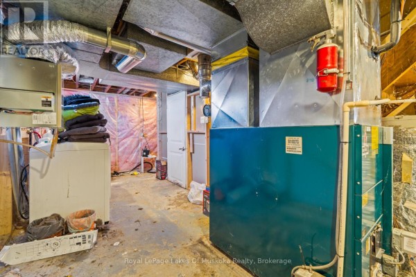 Basement utility room with washer, dryer, furnace, and water heater - 30 Kitchen Road S Huntsville