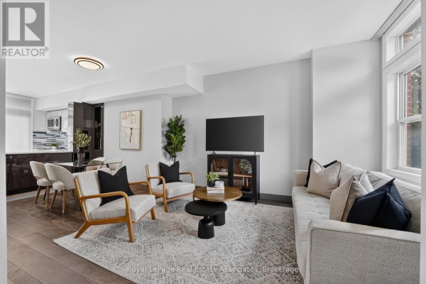 Living room - 30 Michael Power Place, Toronto, ON M9A5G9 Photo 2