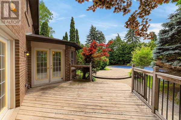 Wooden deck with pool and patio - 30 Ritter Crescent Markham