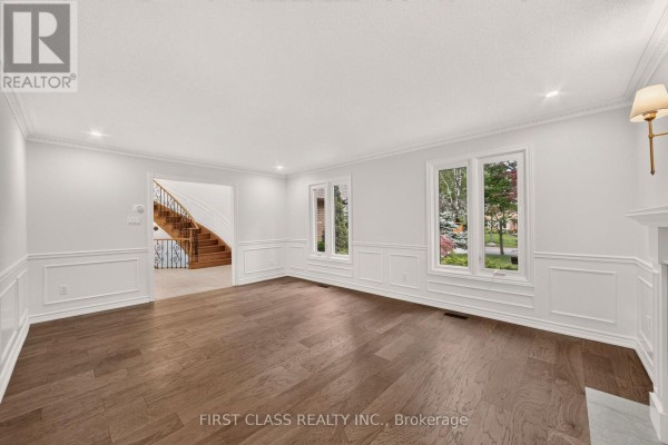View from the living room looking towards the foyer and staircase. - 30 Ritter Crescent, Markham