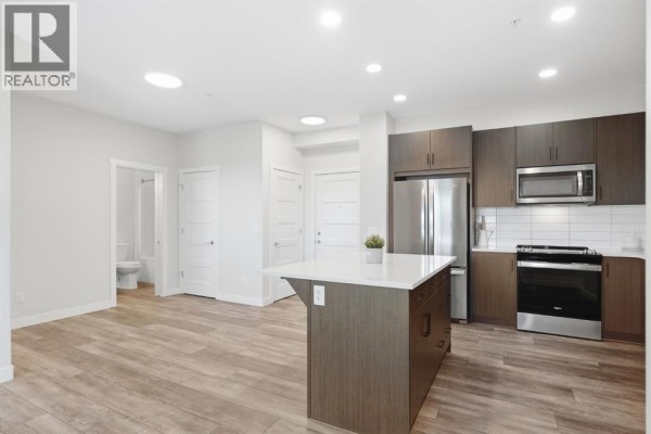 Primary Bedroom - 301, 55 Wolf Hollow Crescent Se, Calgary, AB T2X5K9 Photo 4