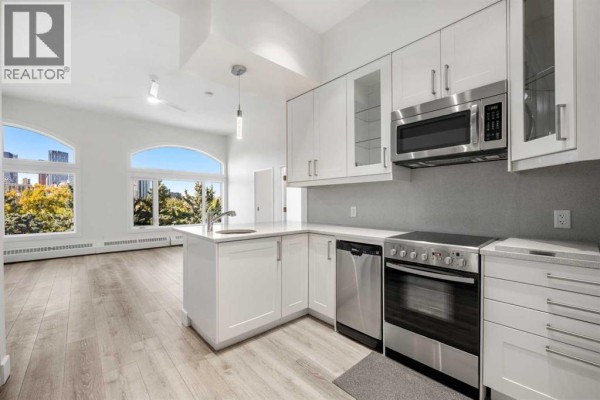 Kitchen - 301, 812 8 Street Se, Calgary, AB T2G2Z2 Photo 2