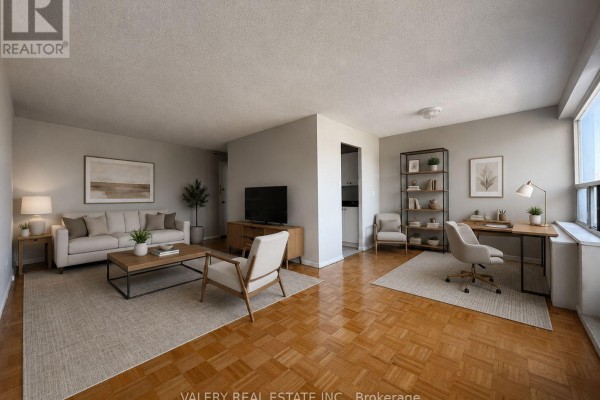 Open-concept living and dining area with light gray walls, parquet flooring, and furniture staging. - 301 - 1725 Lawrence Avenue E, Toronto