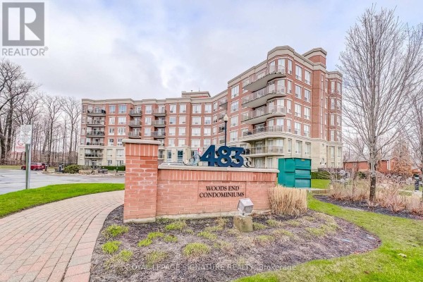 Woods End Condominiums sign and brick building with balconies - 483 Faith Drive Mississauga