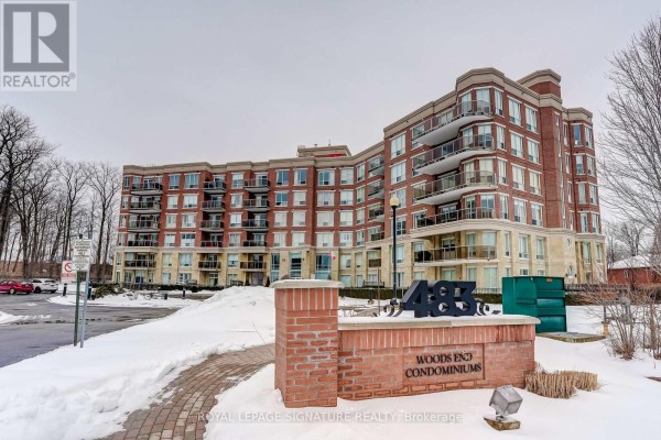 Modern brick condo building with balconies - Woods End Condominiums - 483 Faith Drive Mississauga