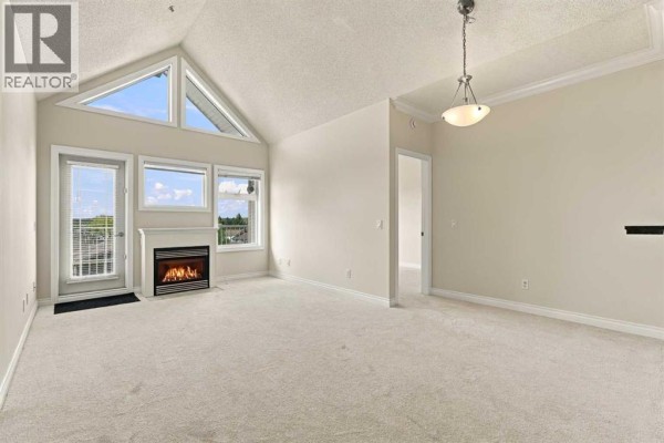 Bedroom - 302, 11170 30 Street Sw, Calgary, AB T2W6J2 Photo 3