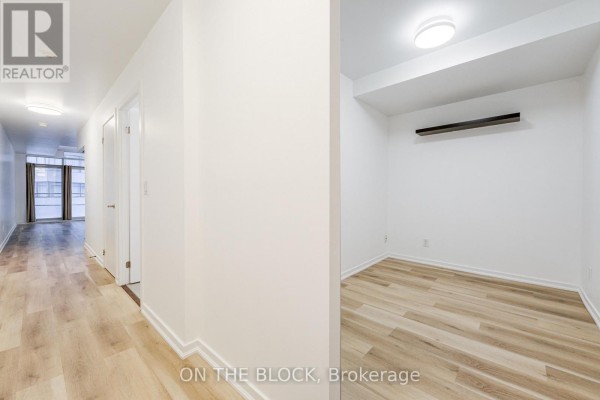 Den - 302 - 38 Joe Shuster Way, Toronto, ON M6K0A5 Photo 3