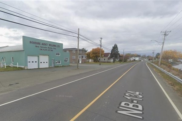 Street view of Soudure Audet Welding Ltd. from NB-134 with surrounding buildings. - 302 Chaleur, Charlo