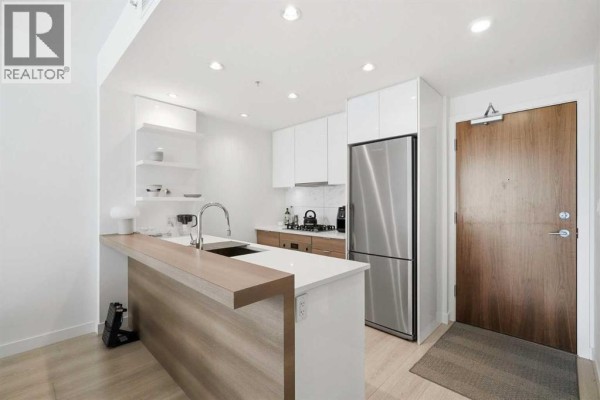 Kitchen - 303, 138 Waterfront Court Sw, Calgary, AB T2P1L1 Photo 4