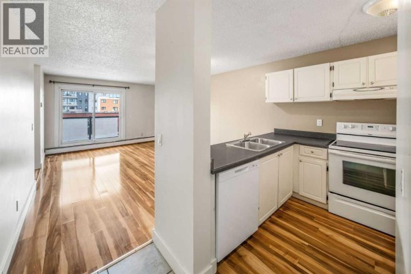 Primary Bedroom - 303, 1915 26 Street Sw, Calgary, AB T3E2A2 Photo 2