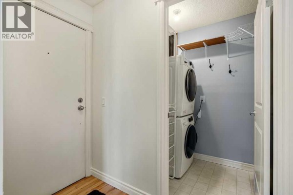Primary Bedroom - 303, 222 5 Avenue Ne, Calgary, AB T3E0K6 Photo 3