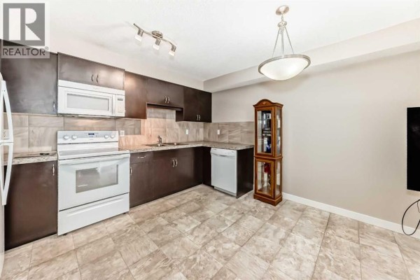 Laundry room - 303, 250 Sage Valley Road Nw, Calgary, AB T3R0R6 Photo 5