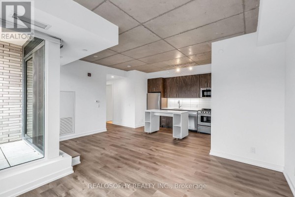 Living room - 303 - 115 Larchmount Avenue, Toronto, ON M4M2Y6 Photo 2