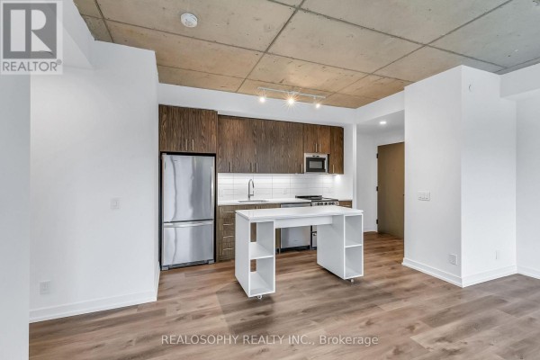 Bedroom - 303 - 115 Larchmount Avenue, Toronto, ON M4M2Y6 Photo 3