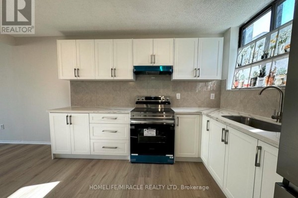 Kitchen - 303 - 665 Kennedy Road, Toronto, ON M1K5E2 Photo 3