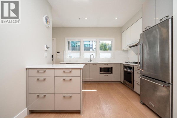 303 1768 55a Street, Delta, BC V4M0A9 Photo 4
