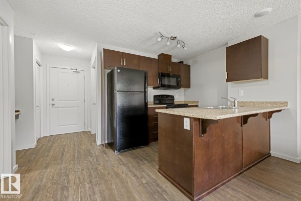 #303 5521 7 Av Sw, Edmonton, AB T6X2A8 Photo 4
