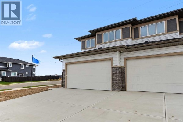 Living room - 303 Dawson Dock Way, Chestermere, AB T1X2W4 Photo 3