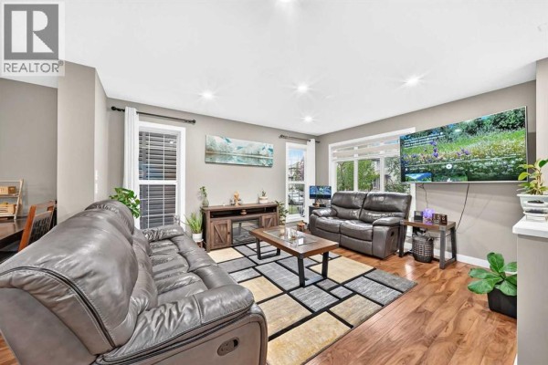 Living room - 303 Saddlebrook Circle Ne, Calgary, AB T3J0K1 Photo 5