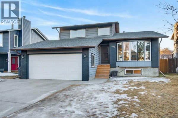 Living room - 303 Woodside Place, Okotoks, AB T1S1L9 Photo 3