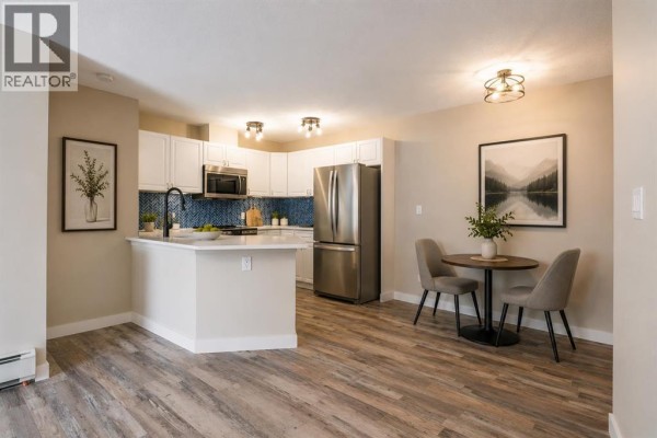 Dining room - 304, 1021 Ross Street, Crossfield, AB T0M0S0 Photo 4