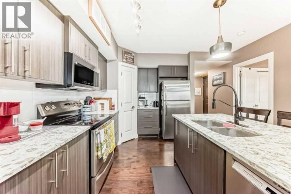 Bedroom - 304, 15207 1 Street Se, Calgary, AB T2X2A2 Photo 4