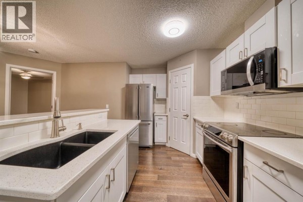 Bedroom - 305, 290 Shawville Way Se, Calgary, AB T2Y3Z9 Photo 4