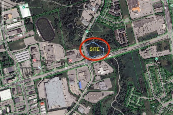 Aerial map shows the proposed apartment building site highlighted in red. - 305 Wellington Street E, Aurora