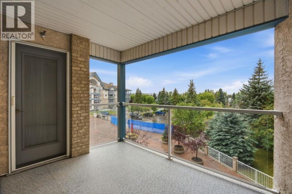 Kitchen - 306, 7239 Sierra Morena Boulevard Sw, Calgary, AB T3H3L7 Photo 2