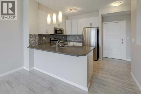 Bedroom - 307, 207 Sunset Drive, Cochrane, AB T4C0H7 Photo 3