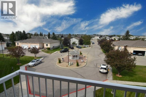 Kitchen - 307, 43 Westlake Circle, Strathmore, AB T1P1T6 Photo 2