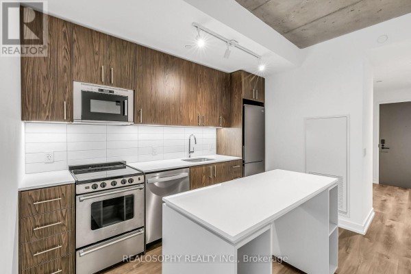 Family room - 307 - 115 Larchmount Avenue, Toronto, ON M4M2Y6 Photo 2
