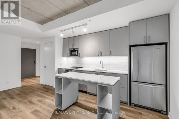 Bedroom - 308 - 115 Larchmount Avenue, Toronto, ON M4M2Y6 Photo 3