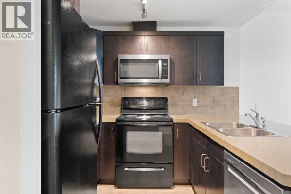 Dining room - 309, 1410 1 Street Se, Calgary, AB T2G5T7 Photo 3